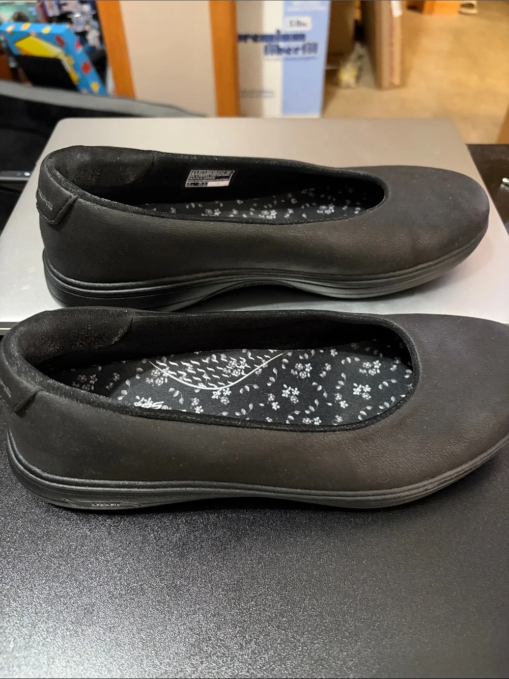Skechers Women's Black Slip-On Floral Insole Flats